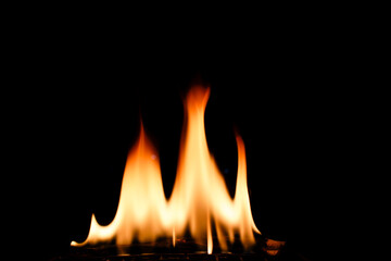 Vibrant Flames Dancing Against a Dark Background in Slow Motion