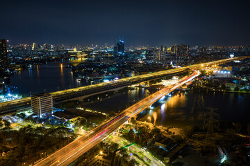 Fototapeta premium Expressway, Self-driving autonomous electric cars of the future with elements move along a busy traffic intersection. Artificial Intelligence, Car Scan, GPS Tracking, Smart Roads, IoT, highway