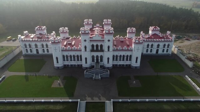 Aerial view of Kossovo Castle in Belarus on a sunny day. Belarusian landmarks