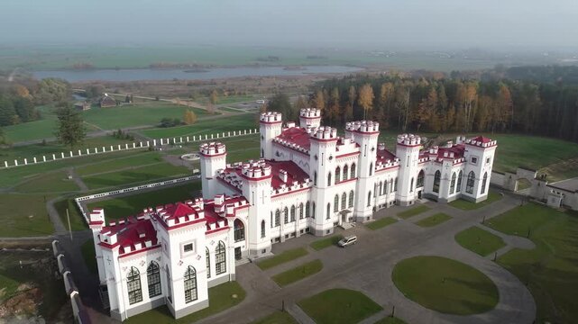 Aerial view of Kossovo Castle in Belarus on a sunny day. Belarusian landmarks