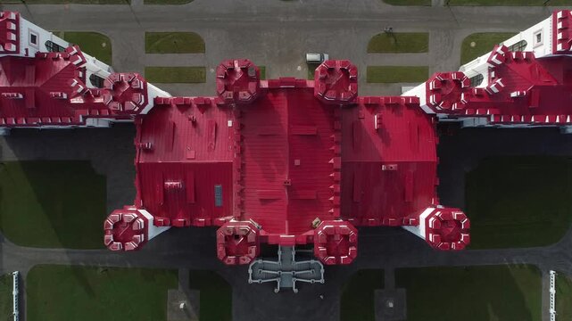 Aerial view of Kossovo Castle in Belarus on a sunny day. Belarusian landmarks