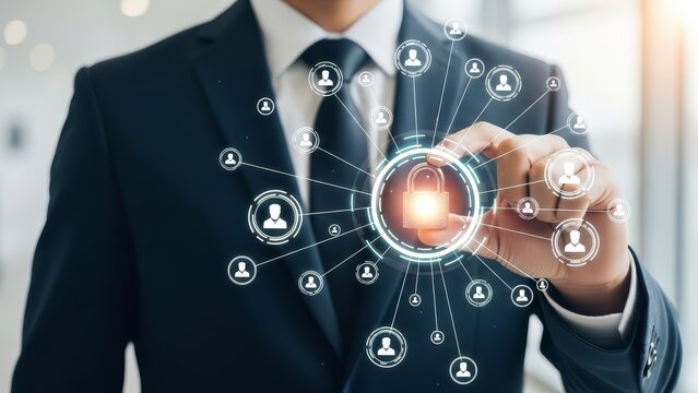 Businessman touches a digital lock icon connected to a network of people, symbolizing data security and protection. - Powered by Adobe