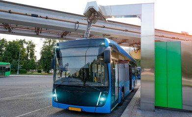 High voltage electric charging station for charging electric buses at the final stop of the city route. Bus final stop with an closed door.