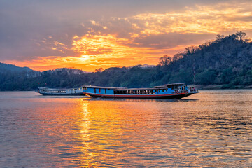 Laos. Luang Prabang,  Mekong River Cruises. Tour tourism on ships and boats. Paradise tourist resort	
