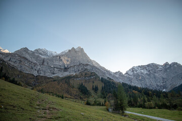 Obraz premium Mountain Landscape with Autumnal Forest and Clear Blue Sky, at Großer Ahornboden, Austria