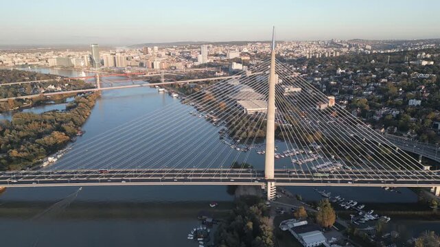 A scenic aerial view of Ada bridge crossing the Sava river in Belgrade, Serbia. Picturesque urban panorama.