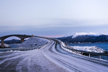 The Atlantic Ocean Road in winter (Nordmore, Norway). Noruega carretera Atlantica.Atlantic Ocean Road at sunset over the ocean, Norway © Mylifeontopdm
