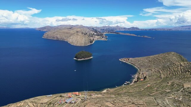 Isla del Sol, Bolivia: Aerial drone footage of the Isla del sol, the sun island, on the lake Titicaca in the Andes with Copacabana and the mainland in the background in the Bolivia