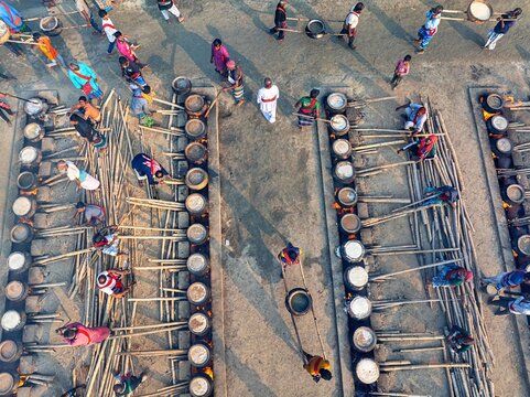 Faridpur, Bangladesh, January 12, 2026 -- Volunteers prepare meals on thousands of stoves during the annual Urs at the World Zaker Manzil shrine in Faridpur.