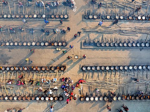 Faridpur, Bangladesh, January 12, 2026 -- Volunteers prepare meals on thousands of stoves during the annual Urs at the World Zaker Manzil shrine in Faridpur.