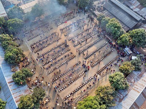 Faridpur, Bangladesh, January 12, 2026 -- Volunteers prepare meals on thousands of stoves during the annual Urs at the World Zaker Manzil shrine in Faridpur.