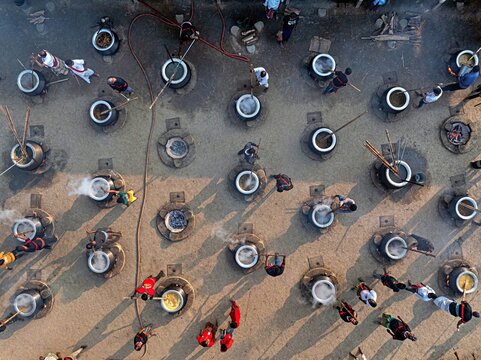 Faridpur, Bangladesh, January 12, 2026 -- Volunteers prepare meals on thousands of stoves during the annual Urs at the World Zaker Manzil shrine in Faridpur.