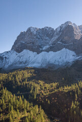 Fototapeta premium Aerial Mountain Landscape with Autumn Forest and Clear Blue Sky, Großer Ahornboden, Austria