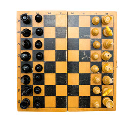 Vintage chess set with chessboard on white background.