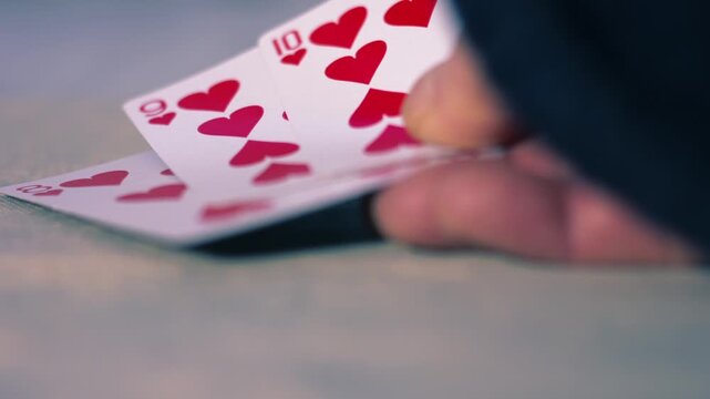 Poker playerwith winning flush hand in card game