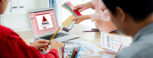 Cyber attacking concept. Malware alert showing on computer screen display scam and threat detection...