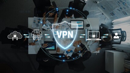 A team engages in a collaborative meeting focused on data security measures, emphasizing VPN technology as a crucial element for safe business operations and connectivity. Raster