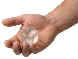 Fototapeta premium Clear Acrylic Cube in Hand, Isolated on White