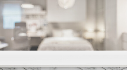 White Table with Blurred Bedroom Background