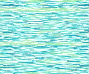 Obraz premium Wavy lines in blue and green colors create a flowing design suitable for backgrounds or textures