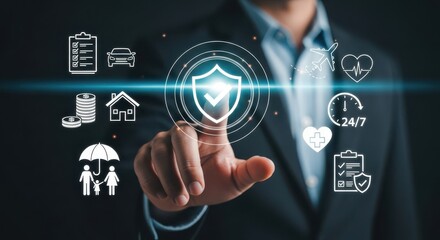 Businessman touching virtual shield icon with security and protection symbols around it on dark background