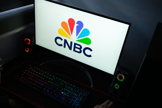 Punta Arenas, Chile &ndash; January 20, 2026: A desktop PC screen showing the CNBC peacock logo alongside an illuminated mechanical keyboard