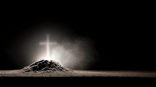 Ash cross emerging from pile of ashes in dark background for Ash Wednesday  