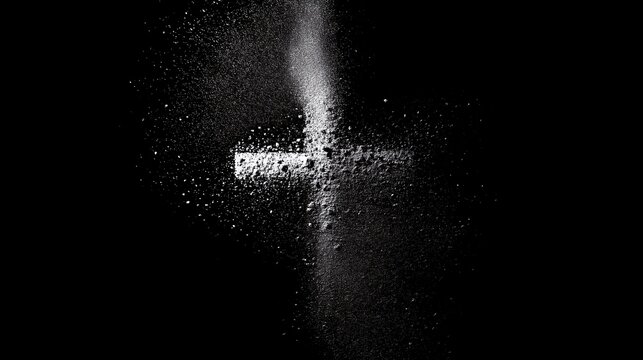 Ash cross created from ashes on dark background for Ash Wednesday  