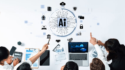 A diverse team collaborates in a modern office setting, utilizing artificial intelligence technology to analyze data, generate insights, and drive innovation. Trope