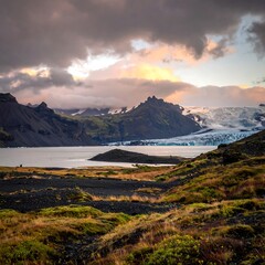 Icelandic Landscape with Glacier and Lake at Sunset.