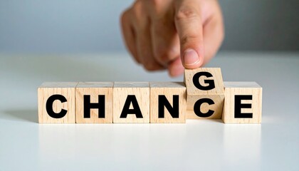 Hand flip wooden cube with word change to chance, Personal development and career growth