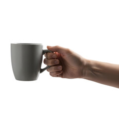 A hand holding a white coffee mug isolated on transparent background