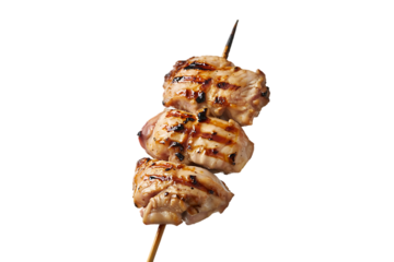 Grilled chicken skewers with visible grill marks isolated on transparent background