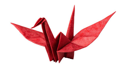 Red paper origami crane with clean folds displayed on a white background at a crafts event