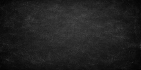 A dark textured blackboard with a grunge vintage surface and aged gray chalk board pattern creates a blank stone wall backdrop for your design © PAGLAA