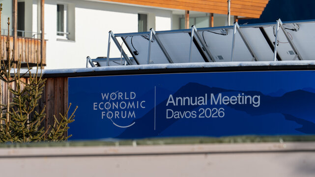Davos, switzerland, january 20th 2026 world economic forum annual meeting davos sign and solar panels