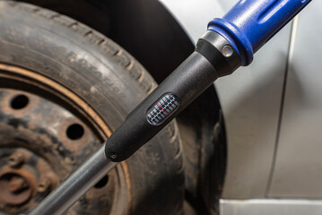 Torque wrench set on the scale to 130 Newton meters.