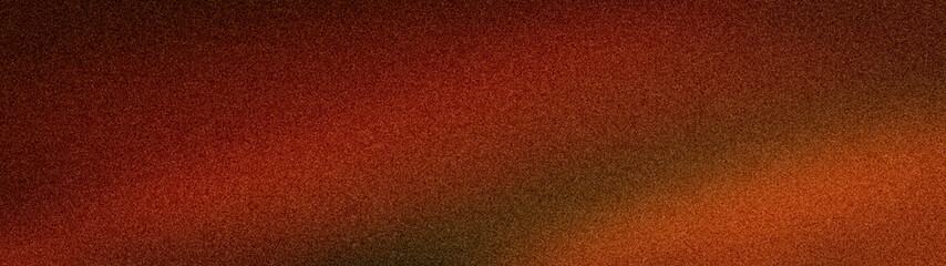 Fototapeta premium Abstract wide grainy background with a warm blurred gradient of orange, red, brown, and dark tones. Vibrant textured banner for autumn or sunset themed designs