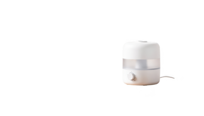 Coolmist humidifier placed on a nightstand against a white backdrop showcasing the compact device designed for nighttime l comfort in a bedroom.