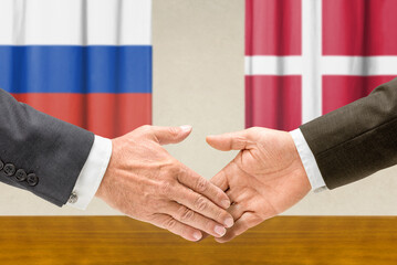 Symbolic cooperation concept &ndash; Russia and Denmark handshake