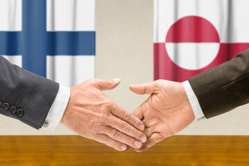 Symbolic cooperation concept &ndash; Finland and Greenland handshake