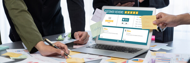 Analyst team use sticky note for creative and analytic brainstorm for business idea with BI data dashboard on laptop screen. Analysis financial data visualization tech for marketing strategy. Prodigy