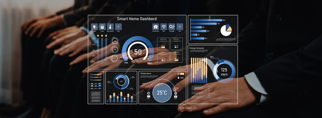 Business professionals evaluate a smart home dashboard featuring charts and analytics. The image highlights data-driven decision-making in energy management and efficiency. Trope