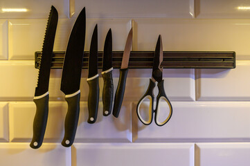 black kitchen knives scissors for white tiles