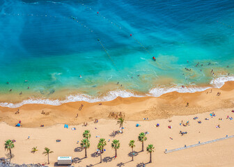 Aerial view of Las Teresitas Beach, with turquoise Atlantic water, golden sand and palms, Tenerife, Canary Islands, Spain