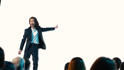 Asian product manager revealing new smartphone launch at convention event, showcasing smart interface with modern design. Engineer makes a sales pitch for product coming soon.