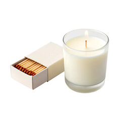 White scented candle with lit wick beside matchbox on white background for home decor