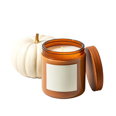 Amber jar candle with blank label beside white pumpkin for seasonal decor and ambiance