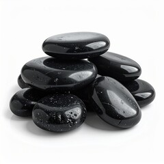 Pile Of Smooth Black Obsidian Stones With White Flecks Scattered On A White Background Studio Lighting