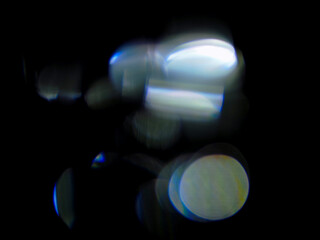 Blue color light leaks on dark background for design and special effect. Abstract shape and color.